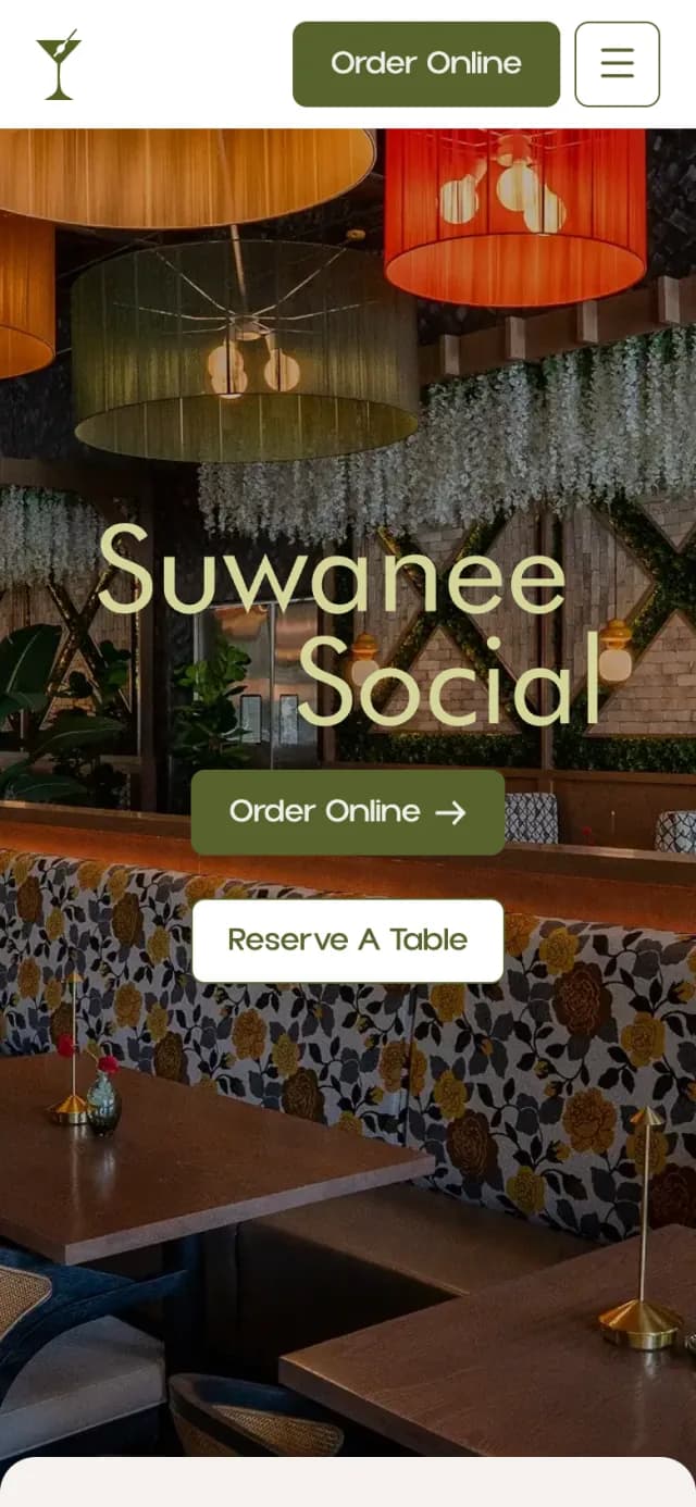 Home page of thesuwaneesocial.com on a phone