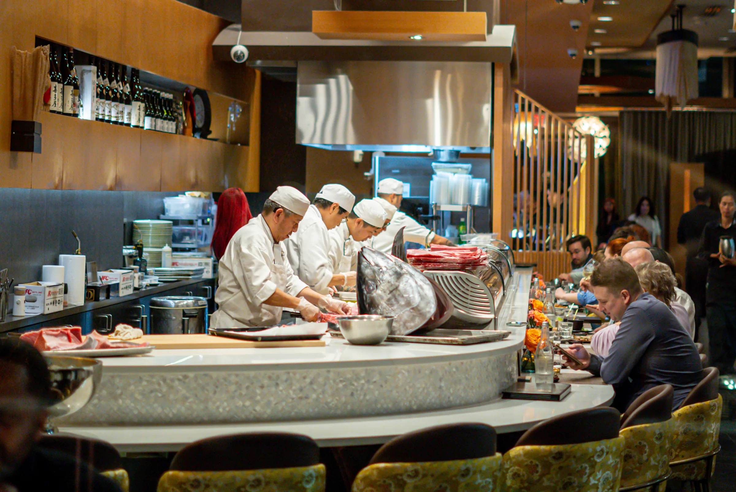 The sushi counter at Tomo Japanese, with the chefs working the bar