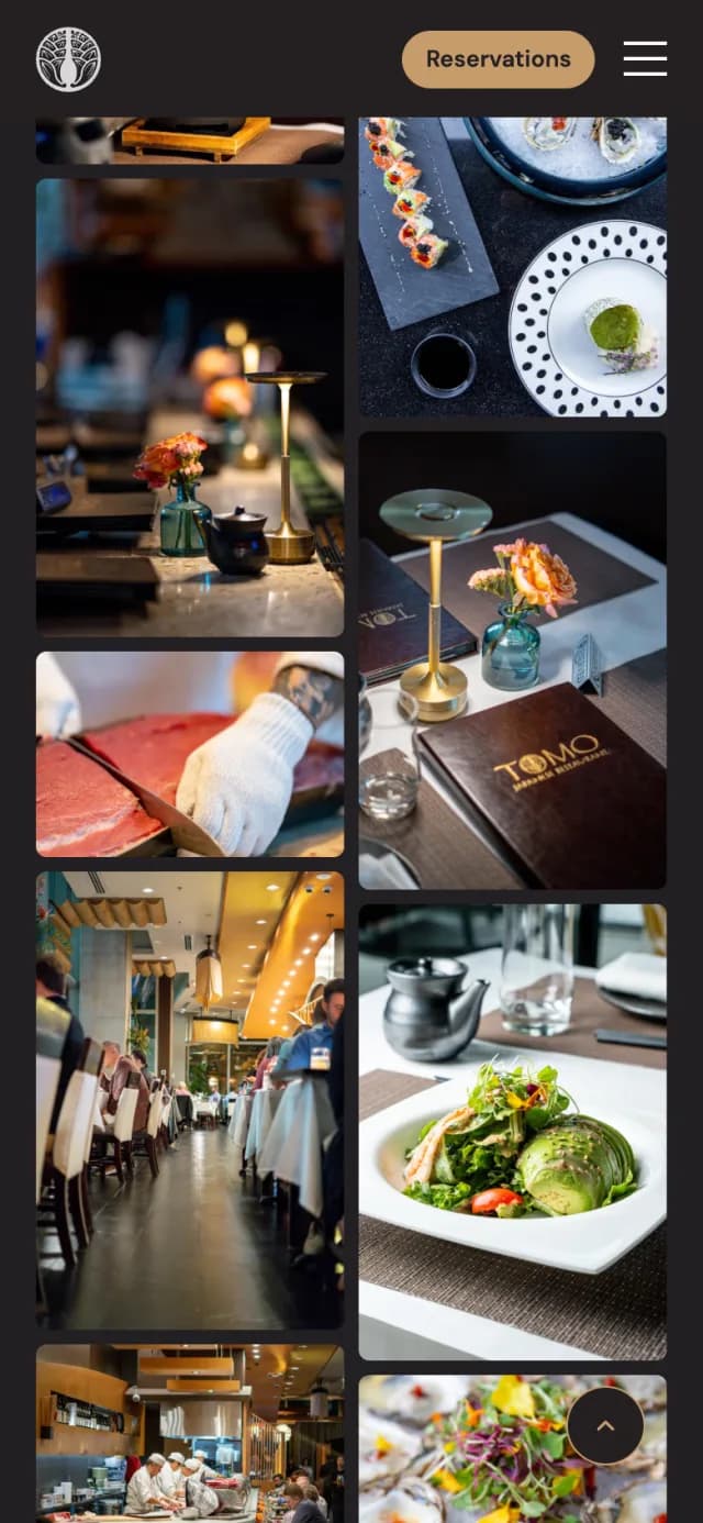 Gallery page of tomorestaurant.com on a phone