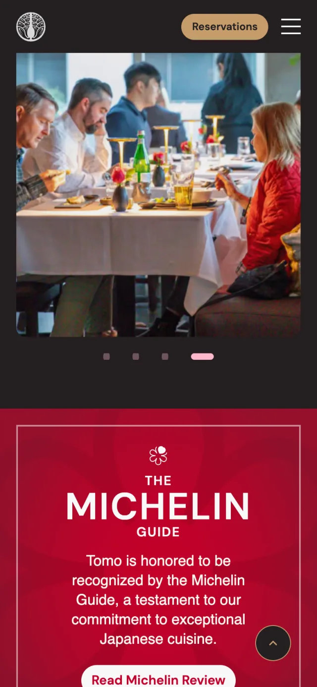 Michelin Guide section of the home page of tomorestaurant.com on a phone