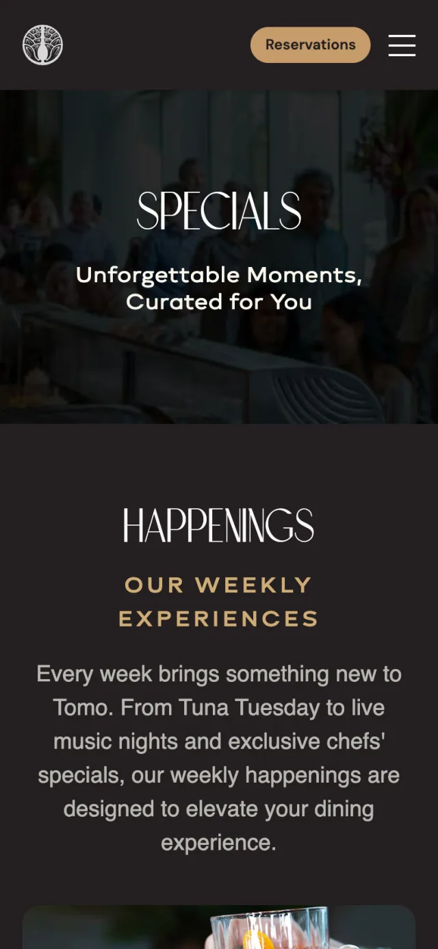 Specials page of tomorestaurant.com on a phone