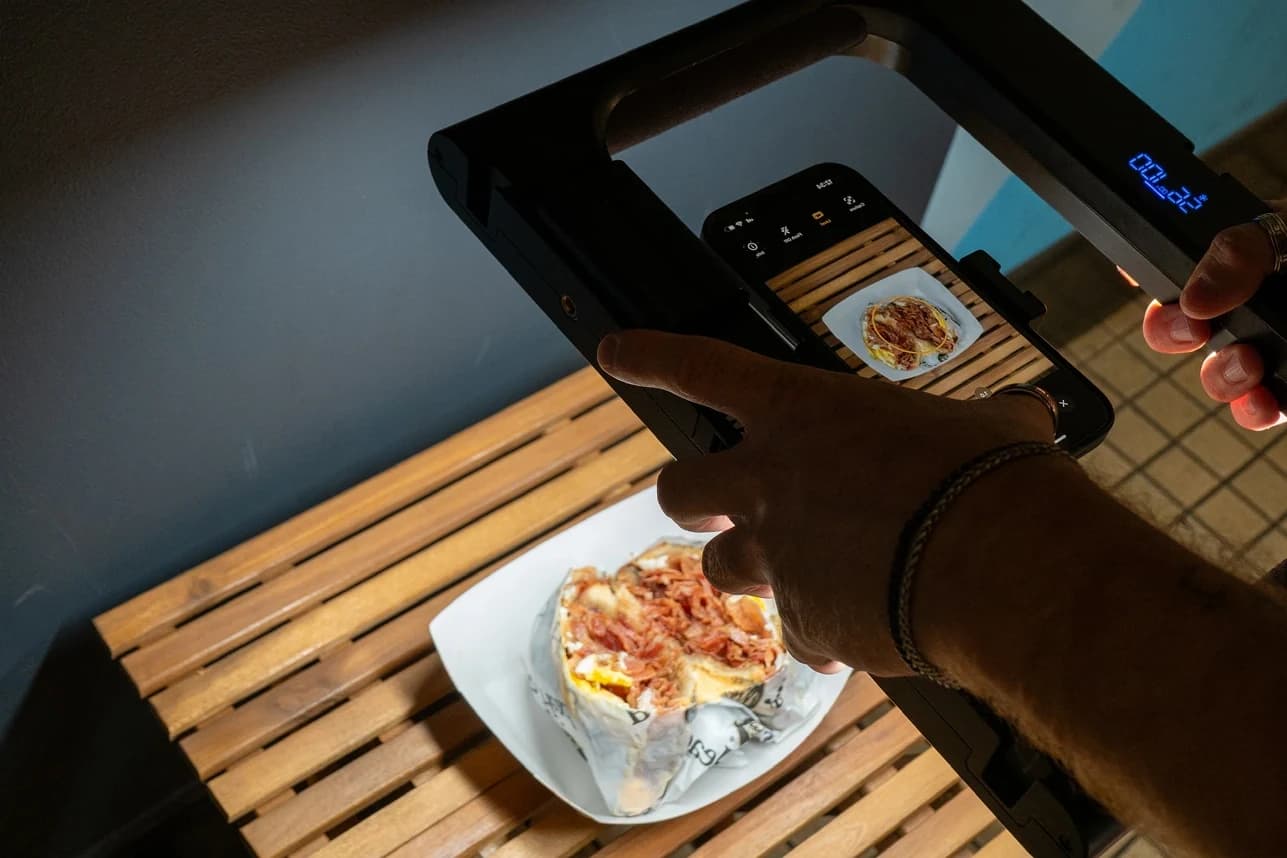 Restaurant owner reviewing digital marketing strategy on a tablet