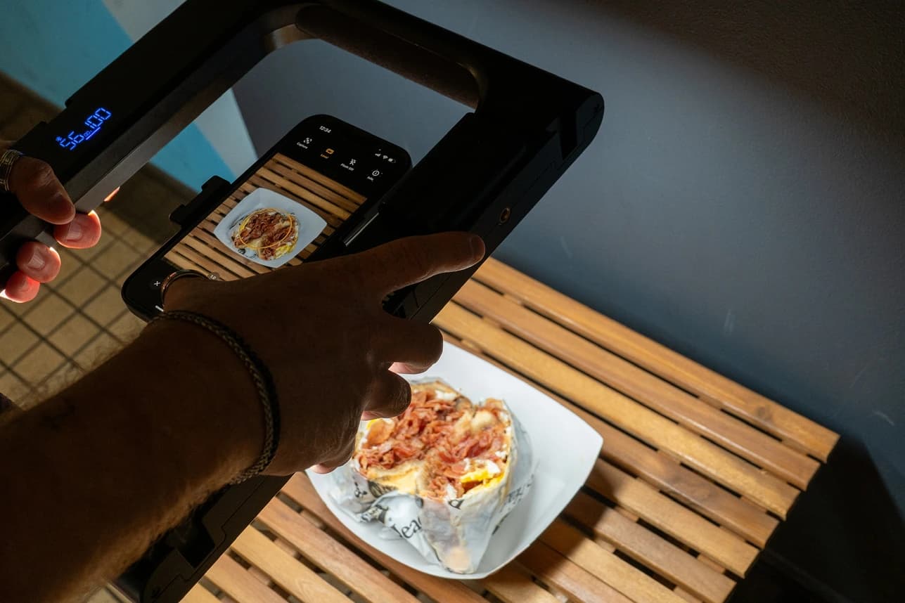 Restaurant owner reviewing digital marketing strategy on a tablet