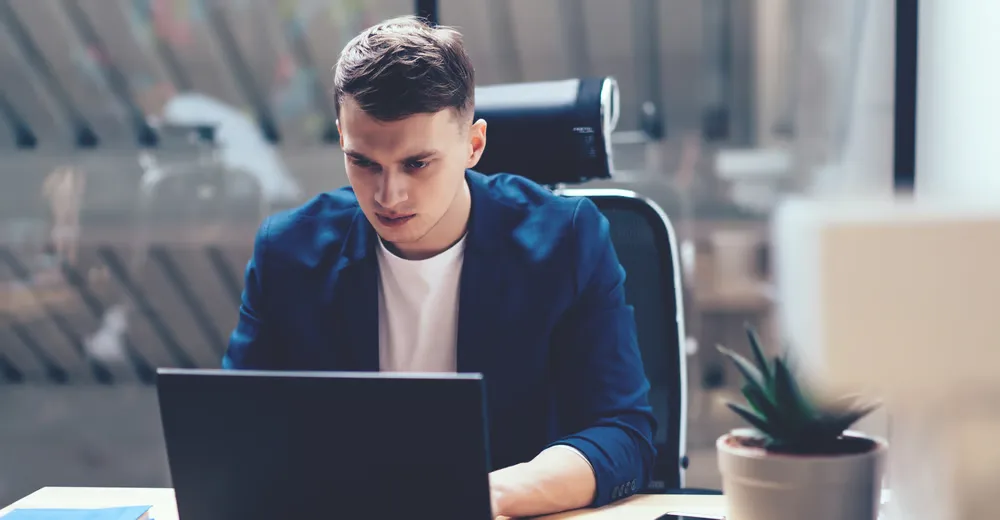 Restaurant operator reviewing monthly performance data on a screen