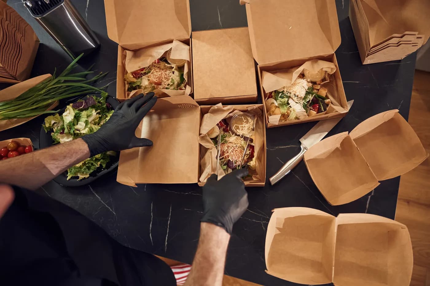 Restaurant team reviewing delivery platform performance