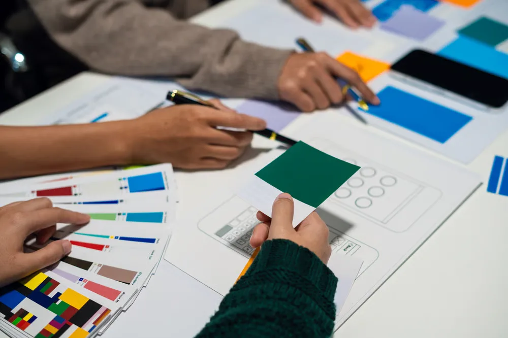 Brand audit and design system being assembled on screen