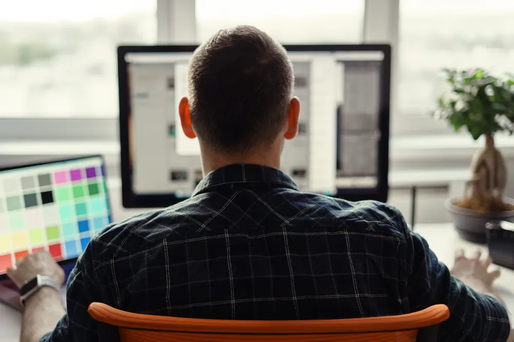 Designer reviewing on-demand restaurant design requests