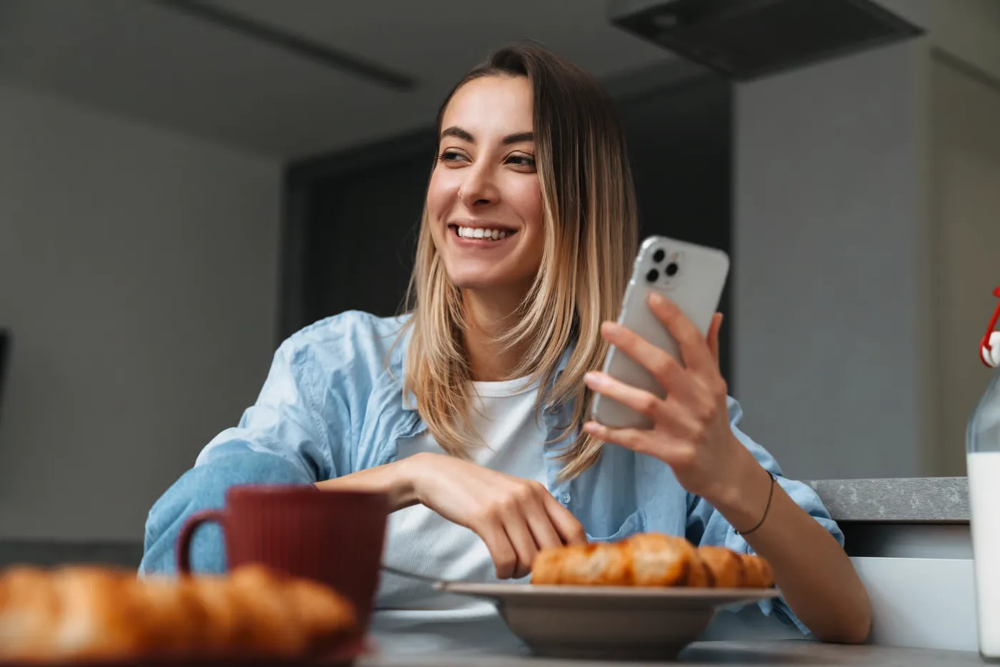 Food influencer reviewing restaurant content on her phone