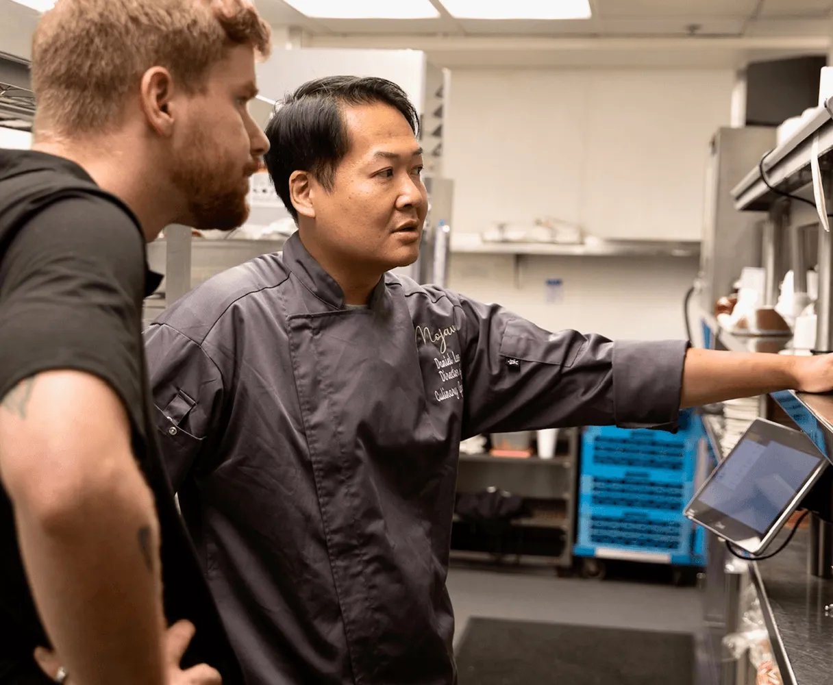 Restaurant kitchen team executing marketing strategy